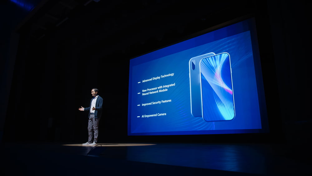 Live,Event,With,Brand,New,Products,Reveal:,Speaker,Presents,Smartphone